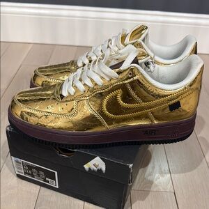 Nike Gold Embossed Sneakers